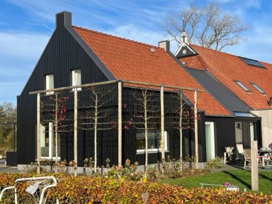 Jan Posthumus, bewoner woonboerderij en eigenaar bouw- en serrebouw bedrijf ‘Onder de binten’